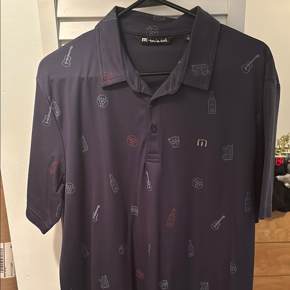 Travis Mathew Blue Polo Shirt Stylish Athletic Design